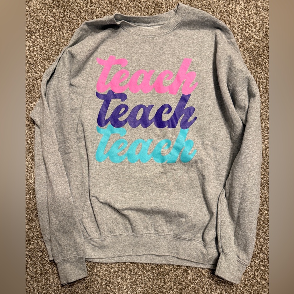 The Shop Forward Sweatshirt with Multicolor 'Teach' Design